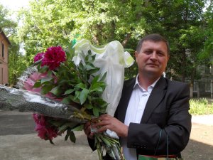 Професор, апикултор, бэрбат ку мынь де аур